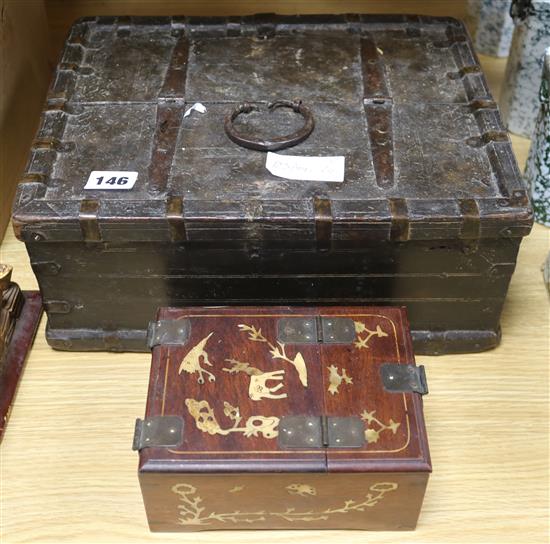 An Indian metal bound hardwood chest and a Chinese hardwood dressing box